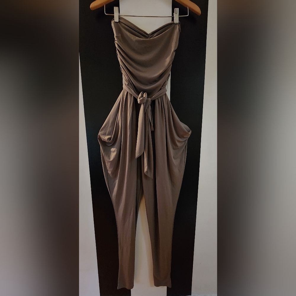 Guess by Marciano. Strapless jumpsuit. Lightly worn. Can be dress-up or down. S.
